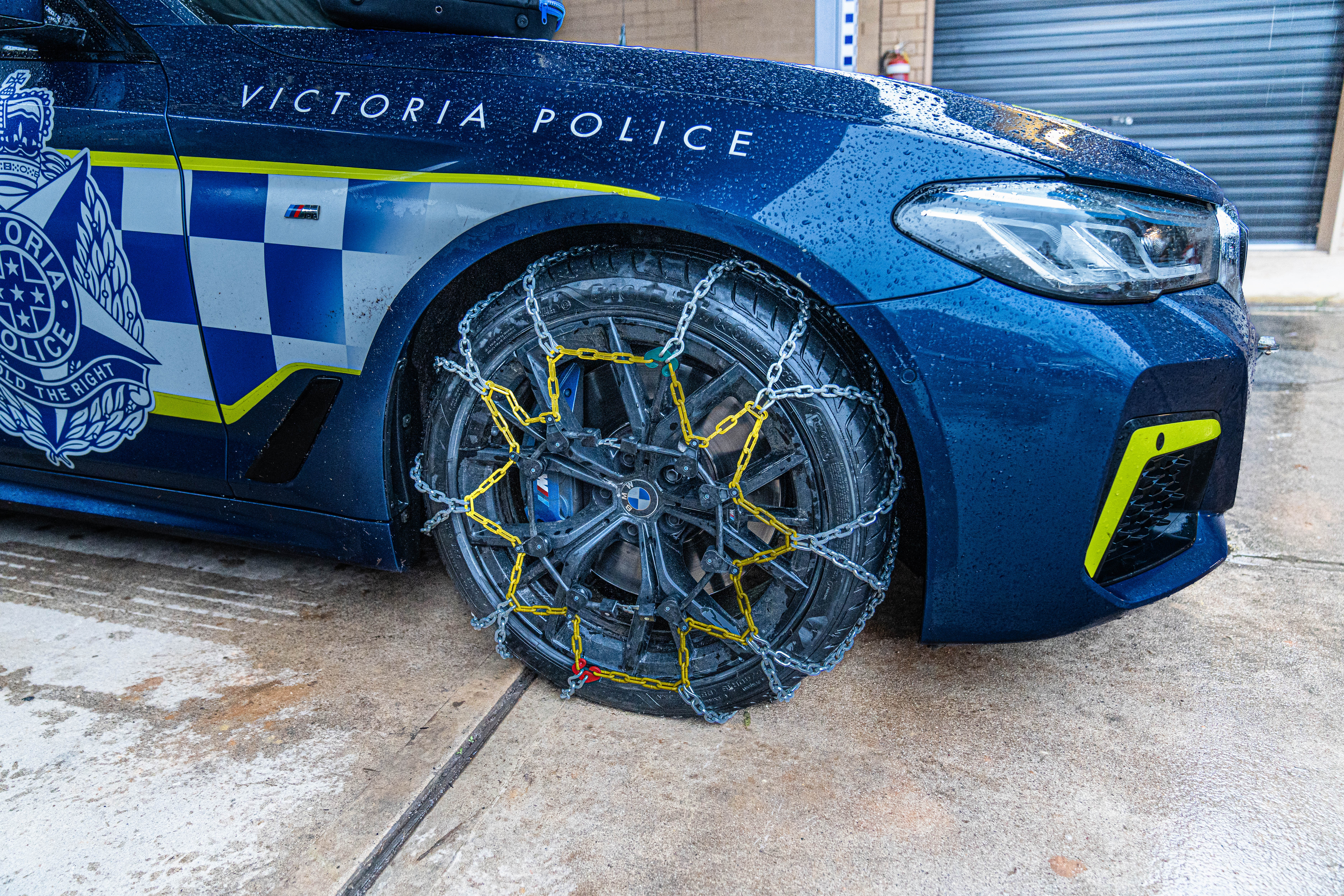 Victoria Police car with fitted snow wheel chains.